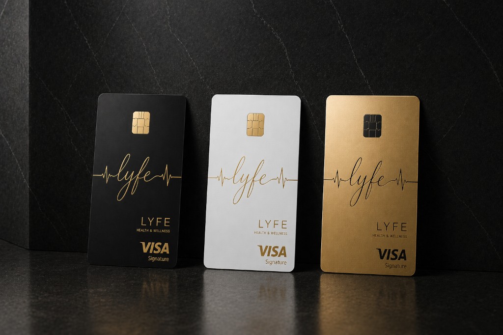LYFE brushed gold elite card with black and white companion cards